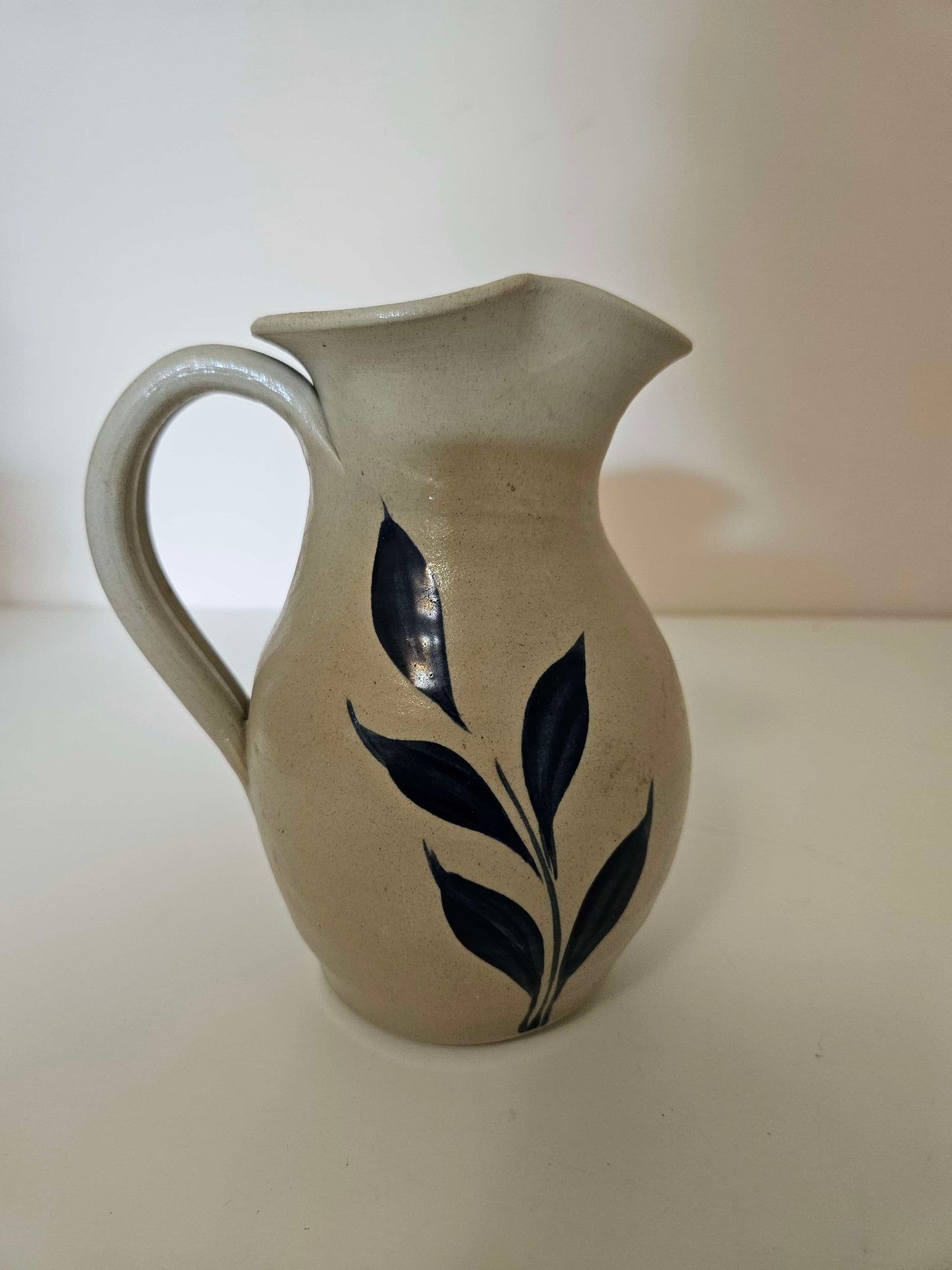 White Clay Pitcher with Blue Leaf
