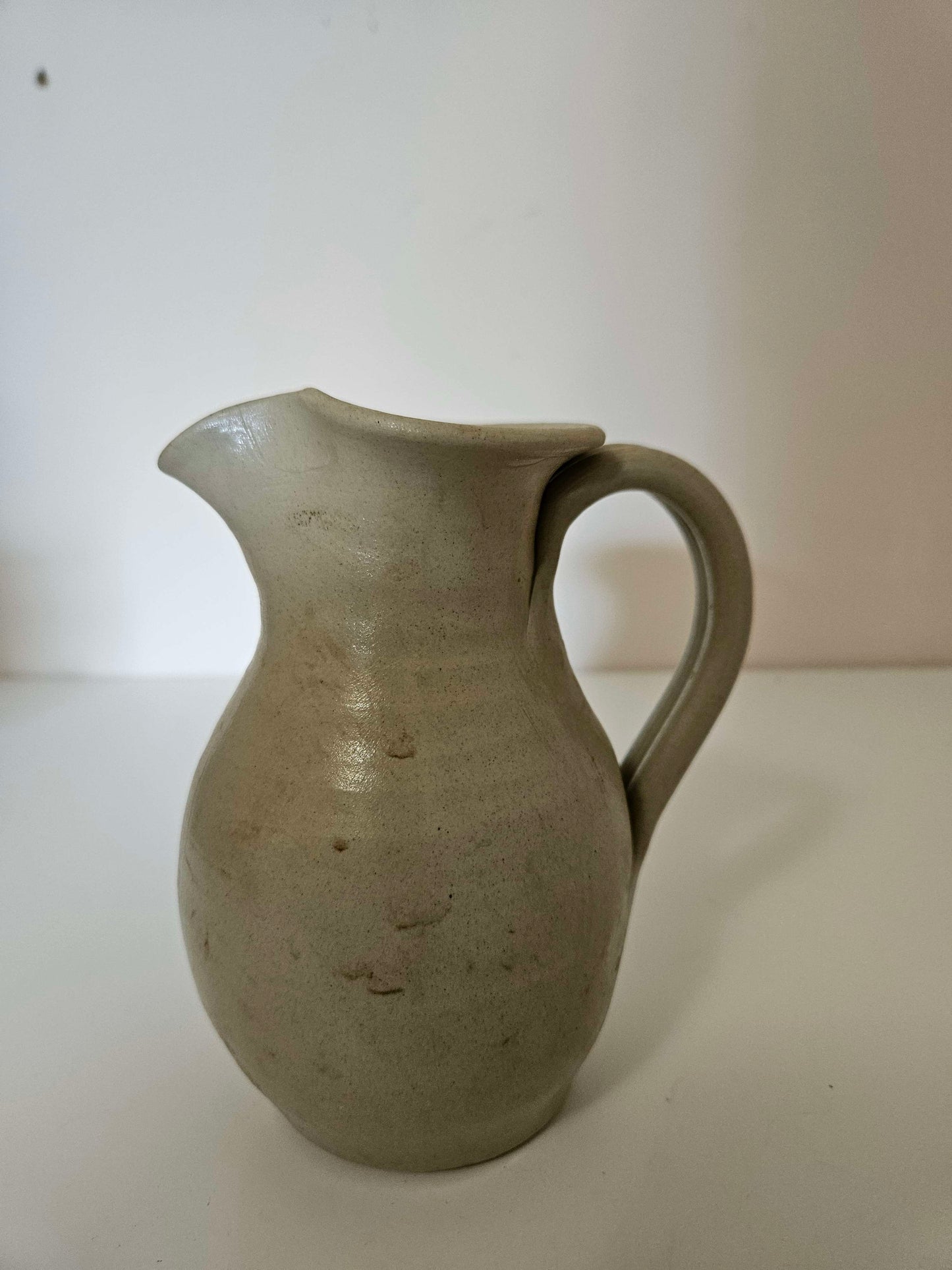 White Clay Pitcher with Blue Leaf
