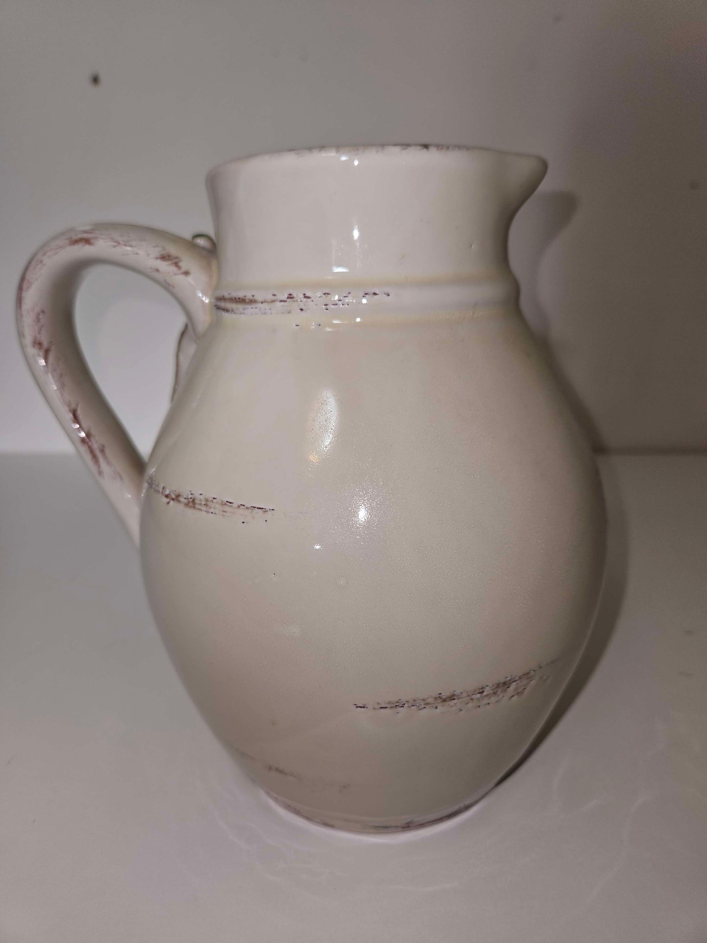 Large Ceramic Pitcher With Leaf Design