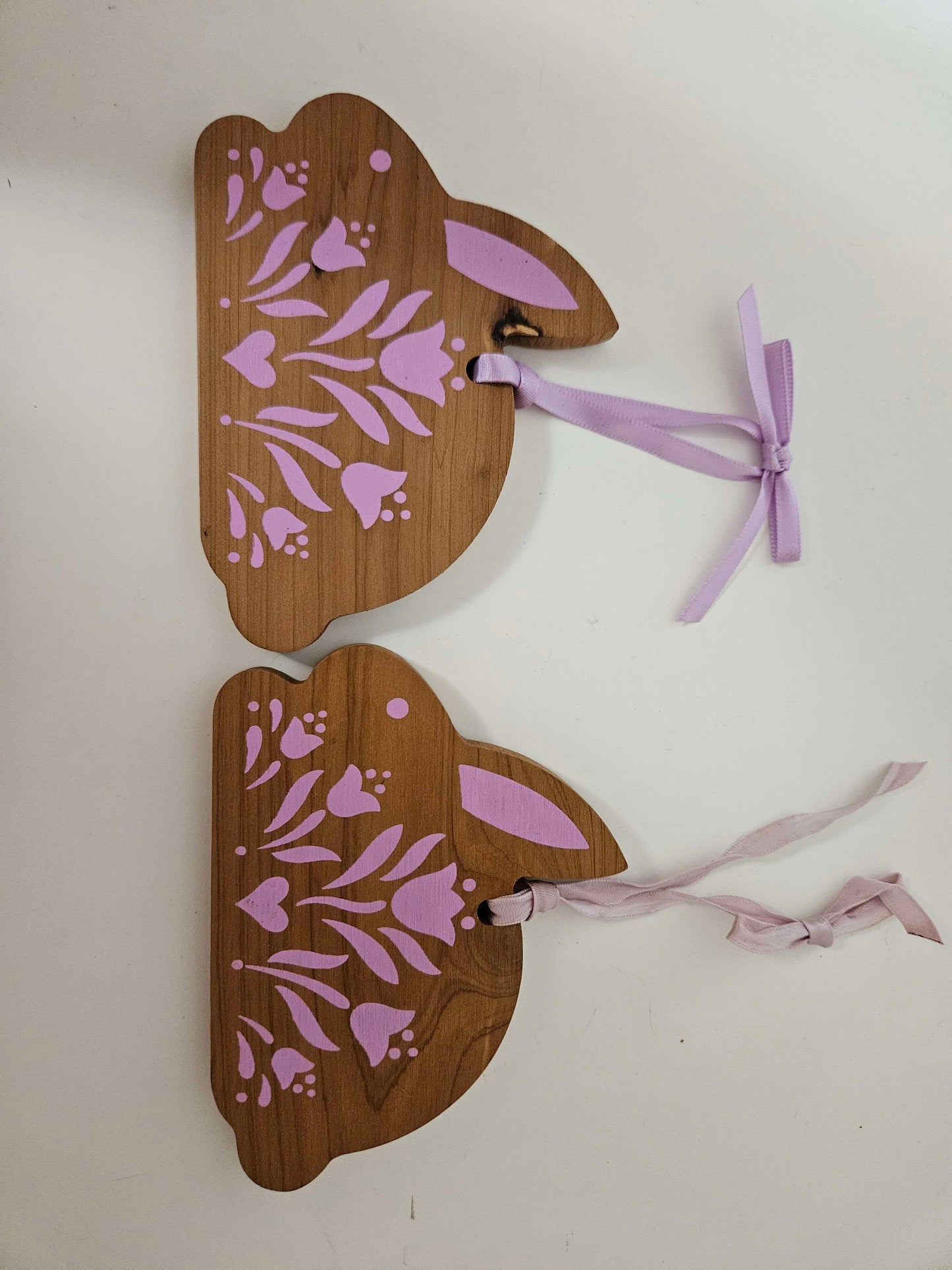 2 Wooden Bunny's With Pink Ascents