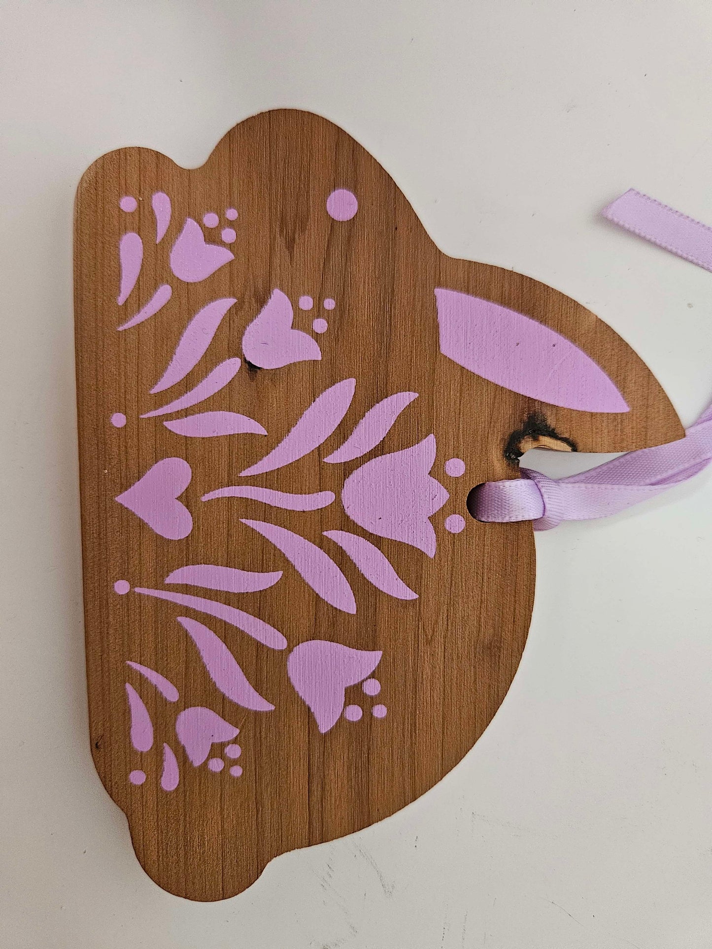 2 Wooden Bunny's With Pink Ascents